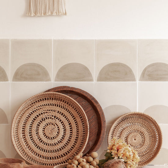 Round Woven Tray handmade by Village Thrive using natural materials.