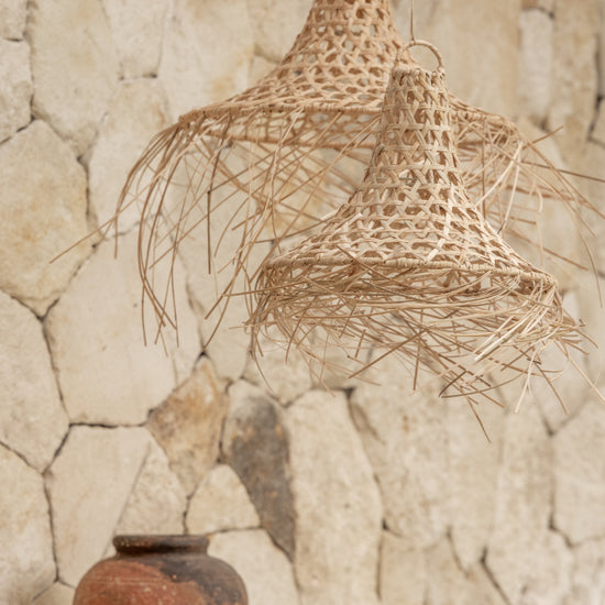 Bukit Rattan Pendant handmade by Village Thrive using natural materials.