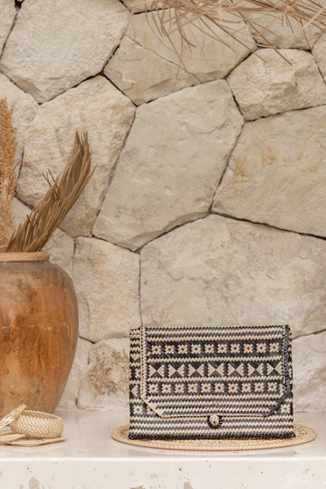 Traditional Motif Rattan Clutch handmade by Village Thrive using natural materials.