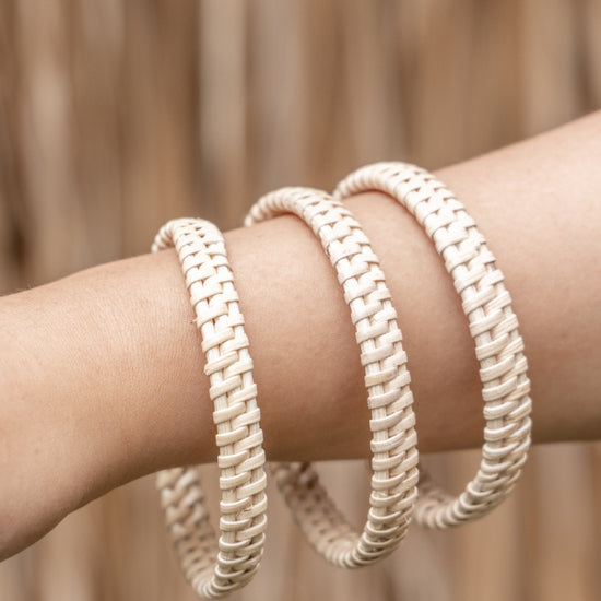 Flat Weave Rattan Bangle handmade by Village Thrive using natural materials.