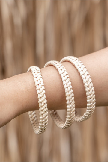 Flat Weave Rattan Bangle handmade by Village Thrive using natural materials.