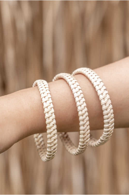 Flat Weave Rattan Bangle handmade by Village Thrive using natural materials.