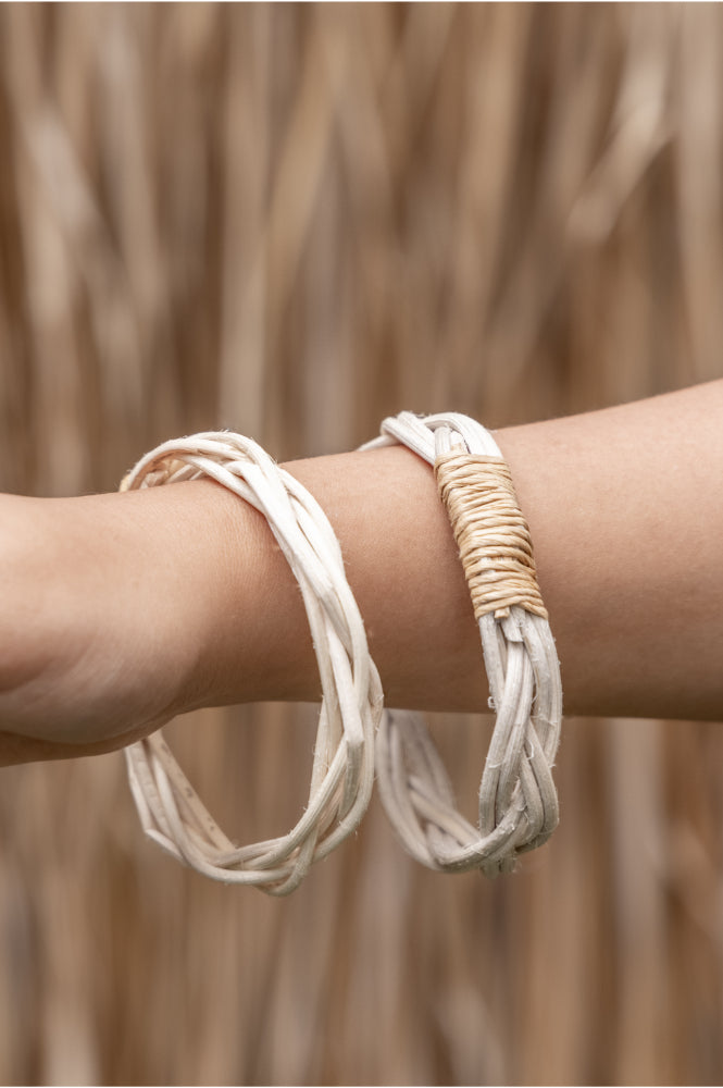Thin Twist Bangle handmade by Village Thrive using natural materials.