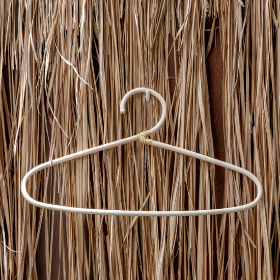 Modern Rattan Hanger handmade by Village Thrive using natural materials.