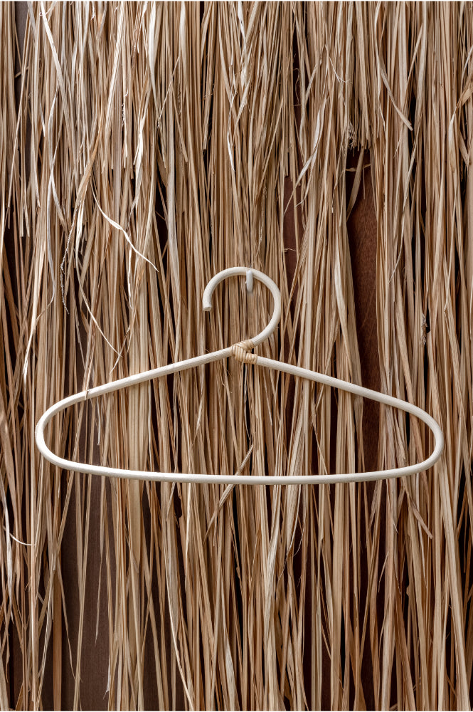 Modern Rattan Hanger handmade by Village Thrive using natural materials.