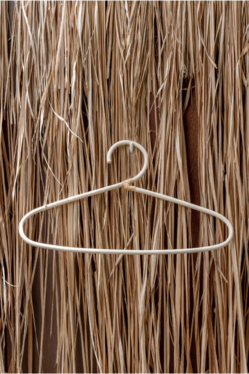 Modern Rattan Hanger handmade by Village Thrive using natural materials.