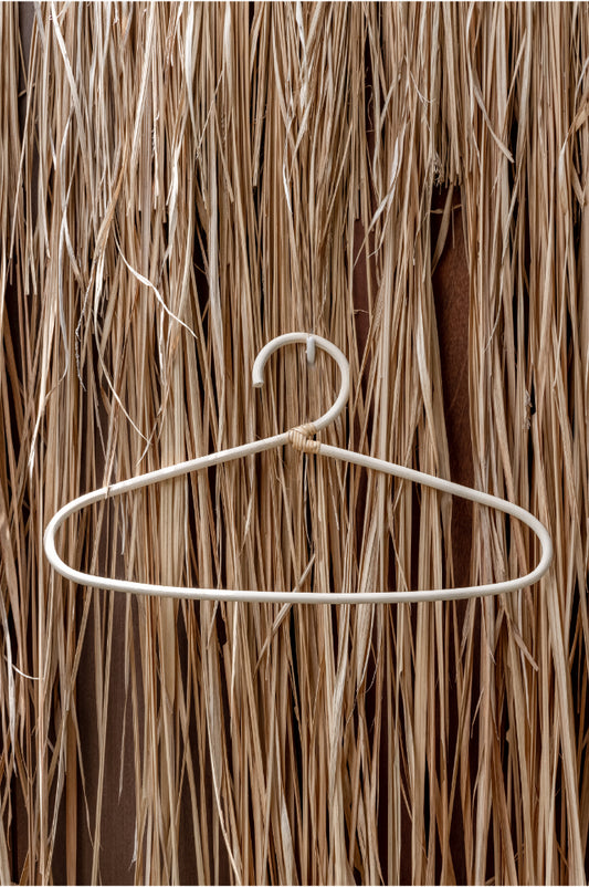 Modern Rattan Hanger handmade by Village Thrive using natural materials.