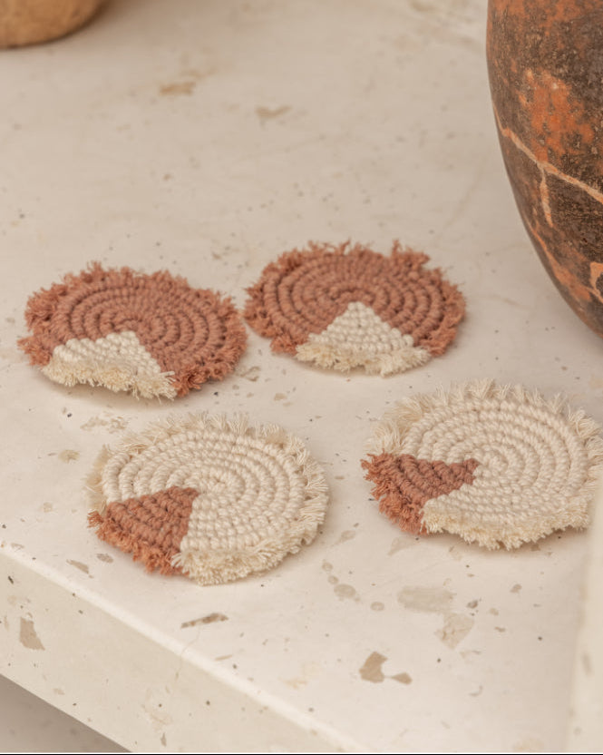 Patterned Coaster Set handmade by Village Thrive using natural materials.