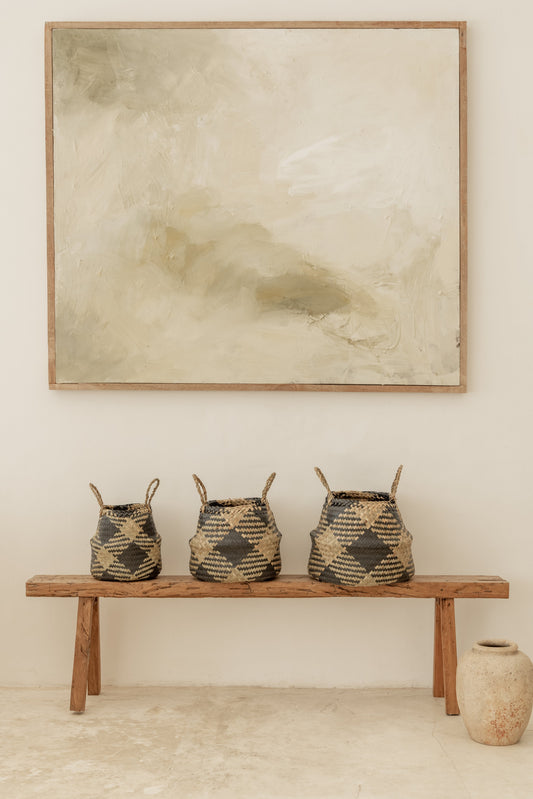 Plaid Woven Storage Basket handmade by Village Thrive using natural materials.