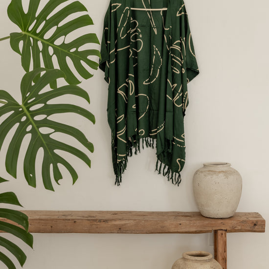 Monstera Kimono handmade by Village Thrive using natural materials.