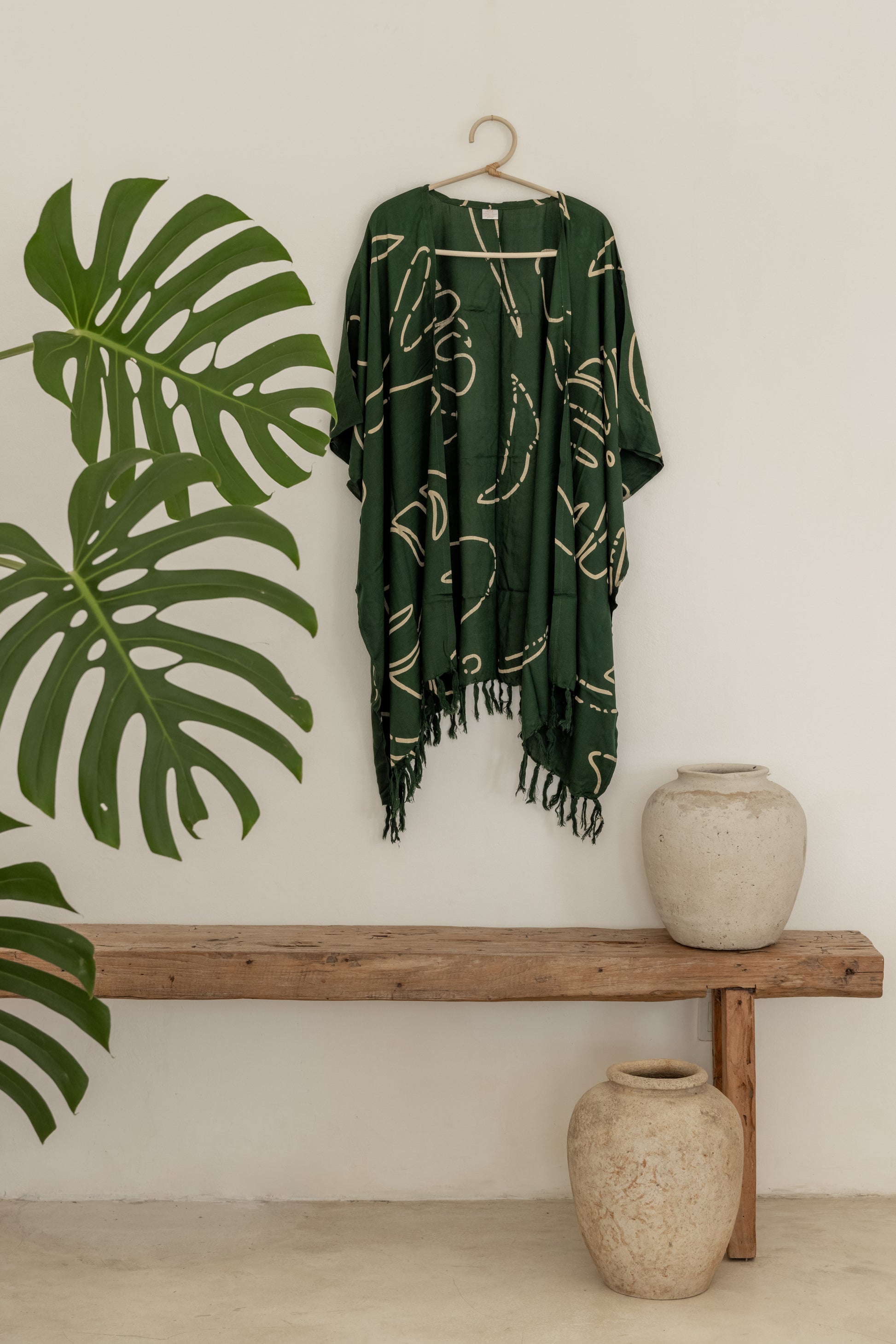 Monstera Kimono handmade by Village Thrive using natural materials.