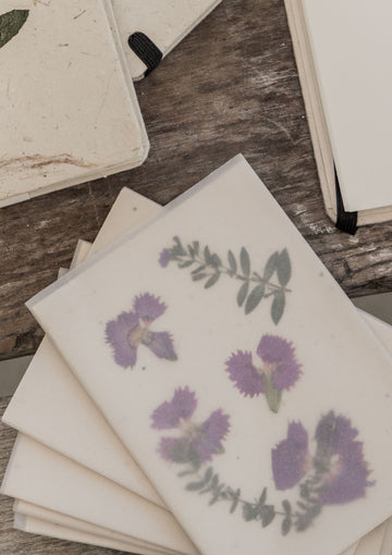Handcrafted Greeting Cards with Pressed Flowers handmade by Village Thrive using natural materials.