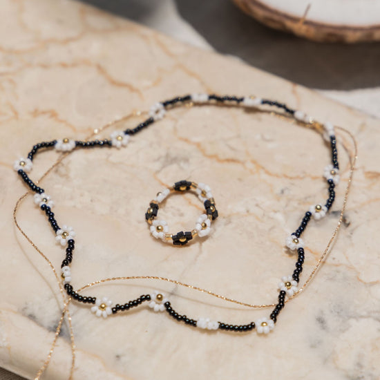 Flora Beaded Necklace and Ring Set handmade by Village Thrive using natural materials.