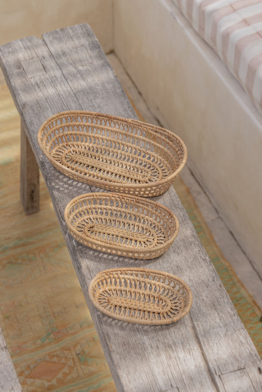Oval Rattan Basket Set handmade by Village Thrive using natural materials.