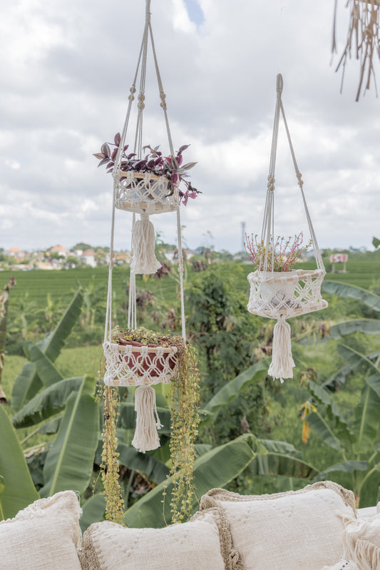 Macrame Hanging Wall Basket handmade by Village Thrive using natural materials.