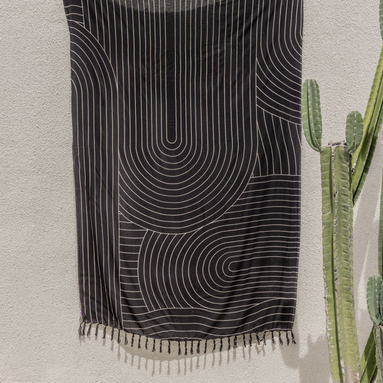 Drift Tapestry handmade by Village Thrive using natural materials.