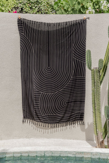 Drift Tapestry handmade by Village Thrive using natural materials.