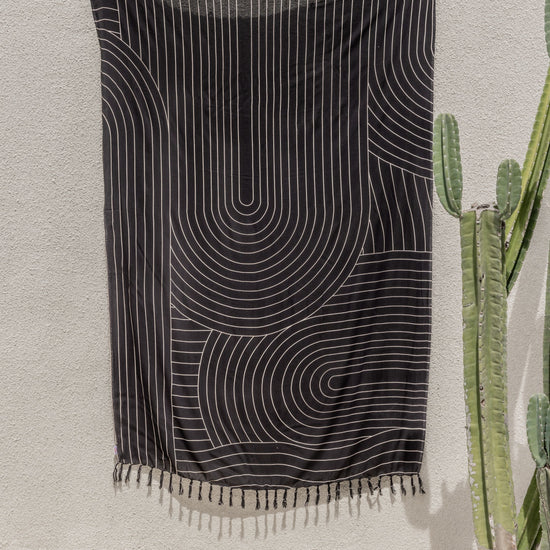 Imperfect Drift Tapestry handmade by Village Thrive using natural materials.