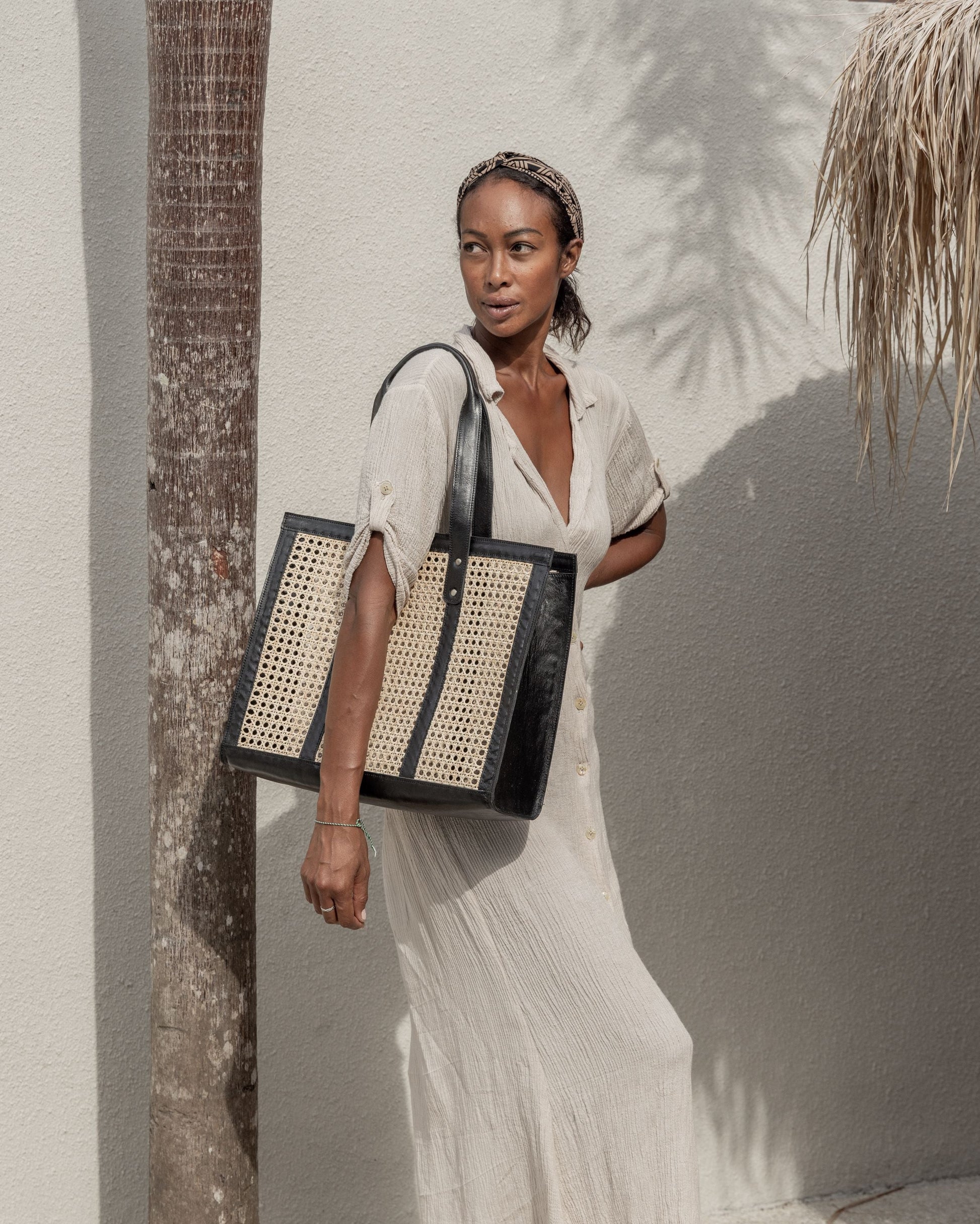 Raja Leather and Cane Everyday Bag handmade by Village Thrive using natural materials.