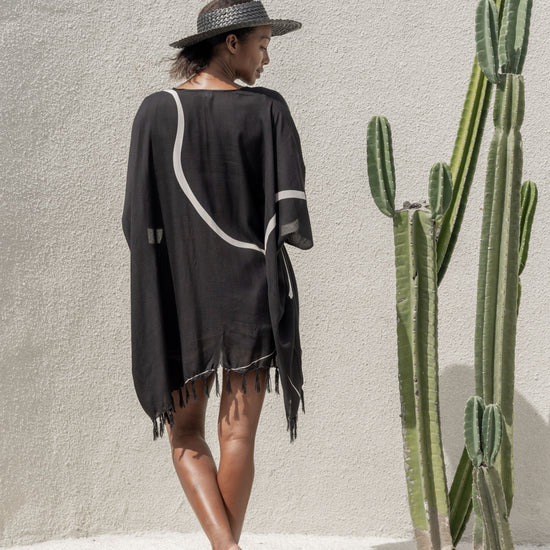 Minimalist Kimono handmade by Village Thrive using natural materials.
