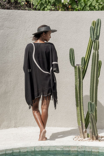 Imperfect Minimalist Kimono handmade by Village Thrive using natural materials.