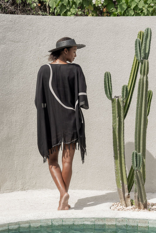 Imperfect Minimalist Kimono handmade by Village Thrive using natural materials.