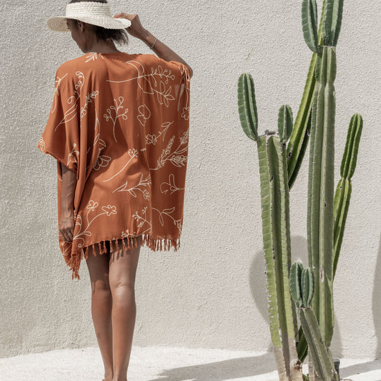Wildflower Kimono handmade by Village Thrive using natural materials.