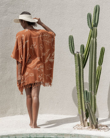 Wildflower Kimono handmade by Village Thrive using natural materials.