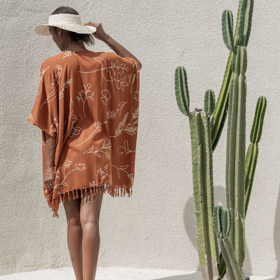Imperfect Wildflower Kimono handmade by Village Thrive using natural materials.