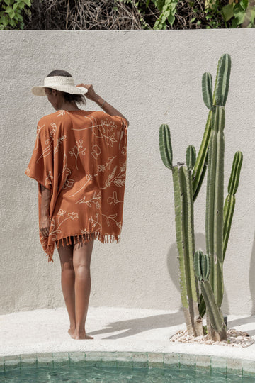 Imperfect Wildflower Kimono handmade by Village Thrive using natural materials.
