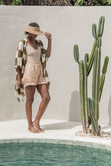Imperfect Checkered Kimono handmade by Village Thrive using natural materials.