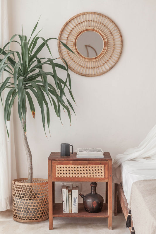 Eliana Rattan Mirror handmade by Village Thrive using natural materials.