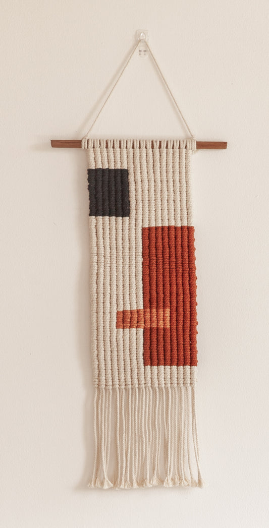 Block Macrame Wall Hanging handmade by Village Thrive using natural materials.