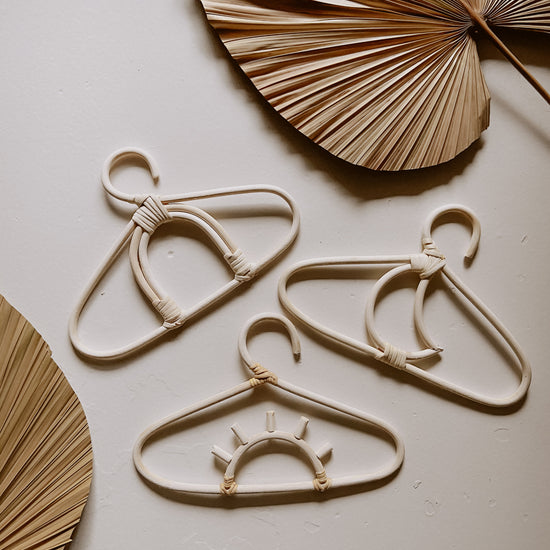 Kids Rattan Hanger Collection handmade by Village Thrive using natural materials.
