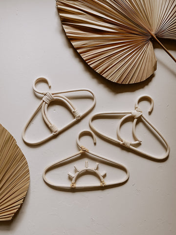 Kids Rattan Hanger Collection handmade by Village Thrive using natural materials.