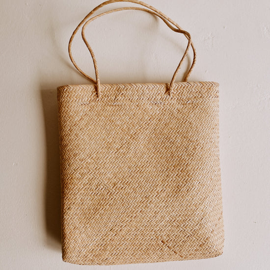 Bela Tote Bag handmade by Village Thrive using natural materials.