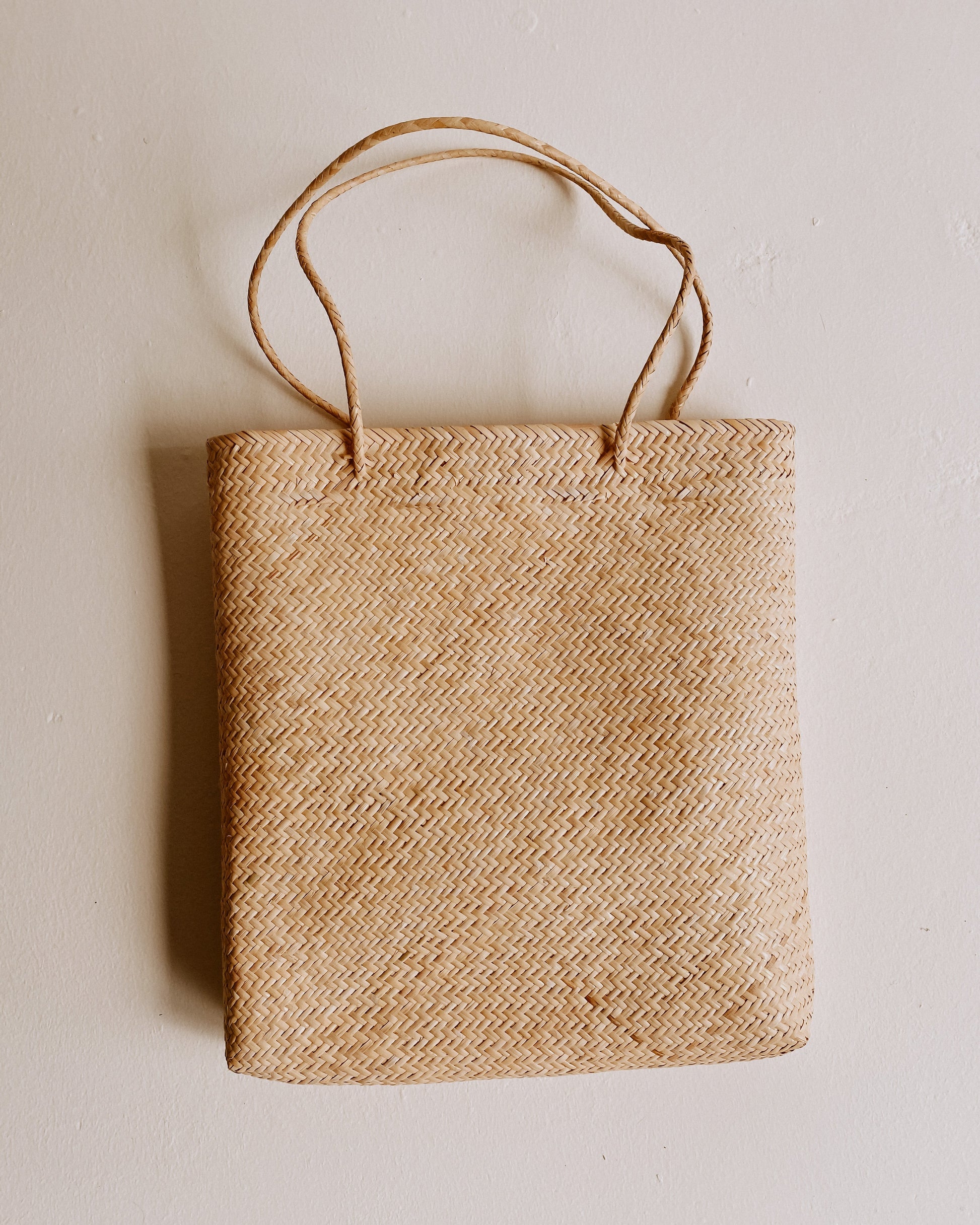 Bela Tote Bag handmade by Village Thrive using natural materials.