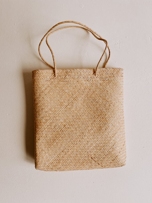 Bela Tote Bag handmade by Village Thrive using natural materials.