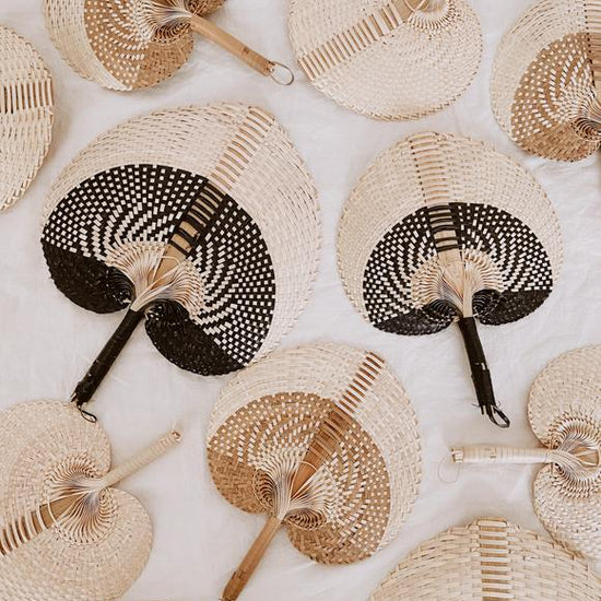 Imperfect Woven Paradisio Fans handmade by Village Thrive using natural materials.