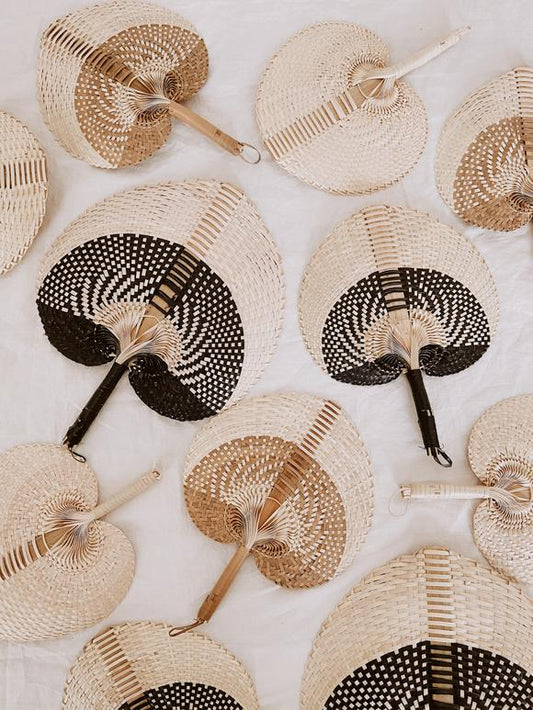 Imperfect Woven Paradisio Fans handmade by Village Thrive using natural materials.