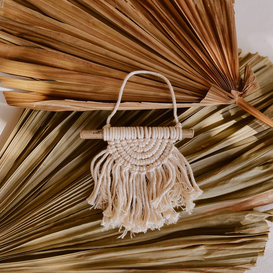 Iris Small Macrame Wall Hanging handmade by Village Thrive using natural materials.