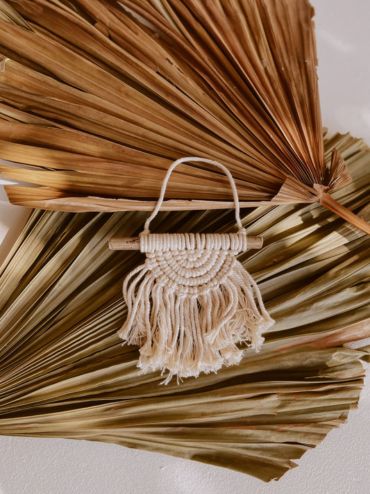 Iris Small Macrame Wall Hanging handmade by Village Thrive using natural materials.
