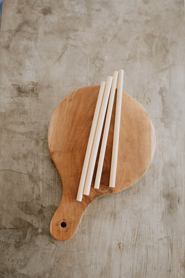 Sustainable Bamboo Straws with Cleaner handmade by Village Thrive using natural materials.