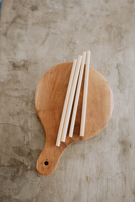 Sustainable Bamboo Straws with Cleaner handmade by Village Thrive using natural materials.