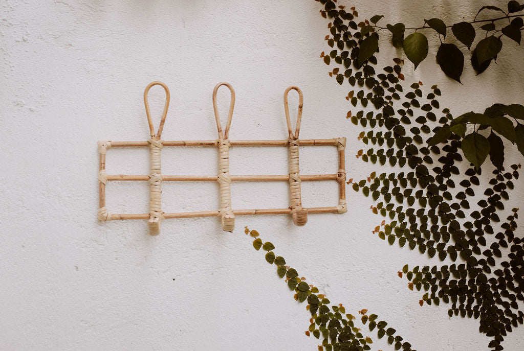 Imperfect Nusa Rattan Wall Hooks handmade by Village Thrive using natural materials.