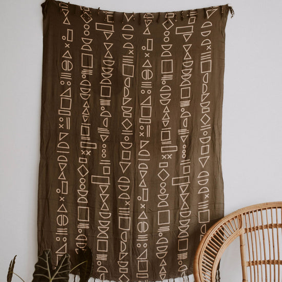 Shapes Tapestry handmade by Village Thrive using natural materials.