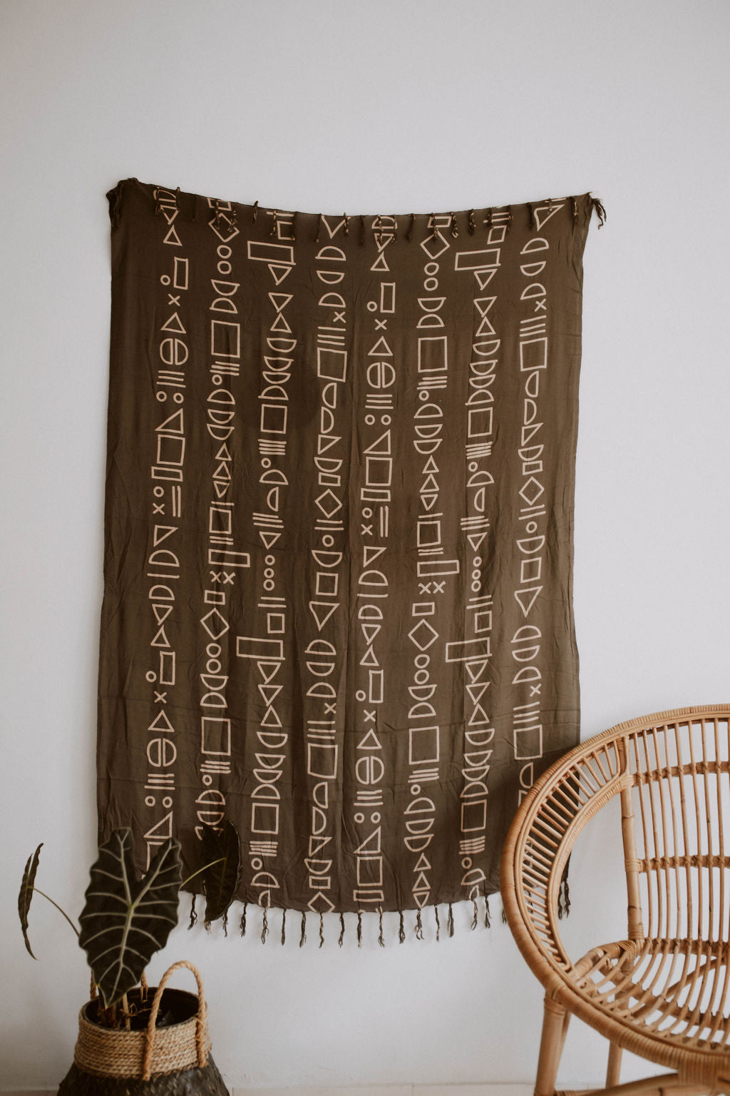 Shapes Tapestry handmade by Village Thrive using natural materials.