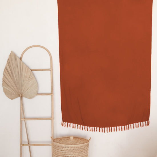 Terracotta Tapestry handmade by Village Thrive using natural materials.