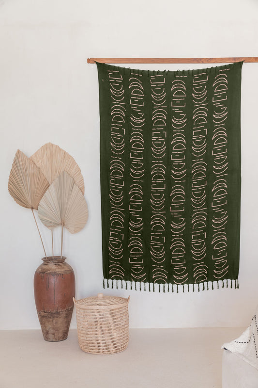 Moon Phase Tapestry handmade by Village Thrive using natural materials.