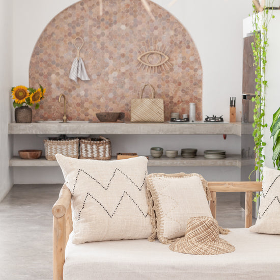 Imperfect Nya Hand Stitched Cotton Throw Pillow handmade by Village Thrive using natural materials.